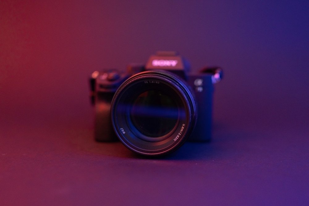 Nothing Can Beat Black Camera On White Silky Cloth